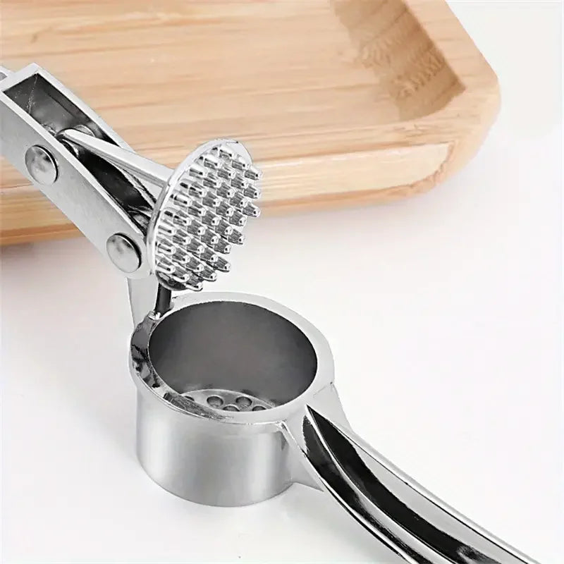 Stainless Steel Garlic Press & Mincer — No More Garlic Hands